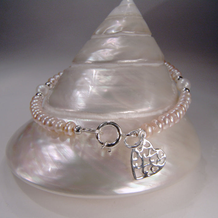 Armband mit  echten Perlen und Herz-Anhänger in Silber