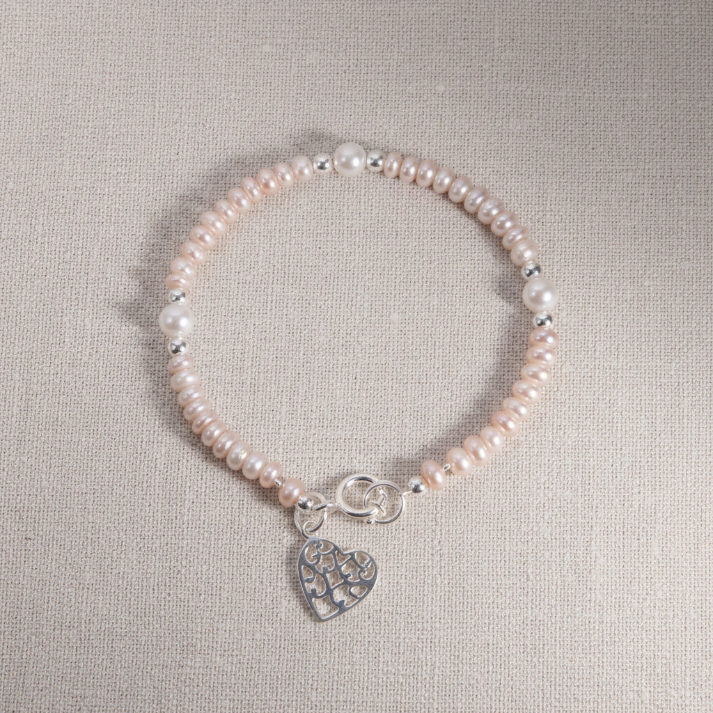 Armband mit  echten Perlen und Herz-Anhänger in Silber