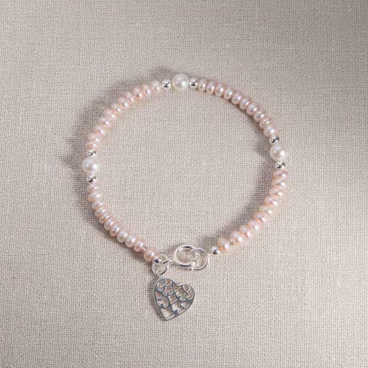 Armband mit  echten Perlen und Herz-Anhänger in Silber