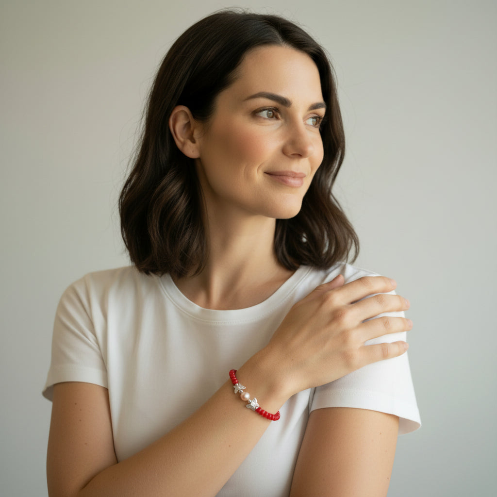 Armband mit Koralle und Silber-Schmetterlingen