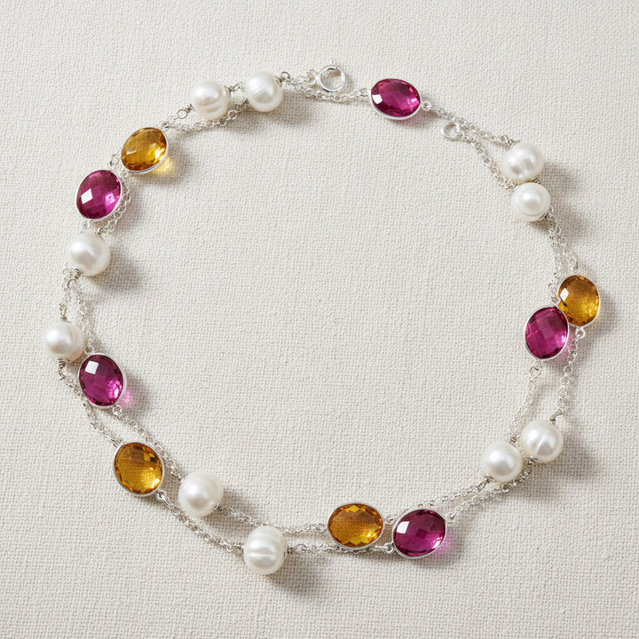 Longkette mit Süßwasserperlen und silbergefassten Steinen in Fuchsia und Gelb