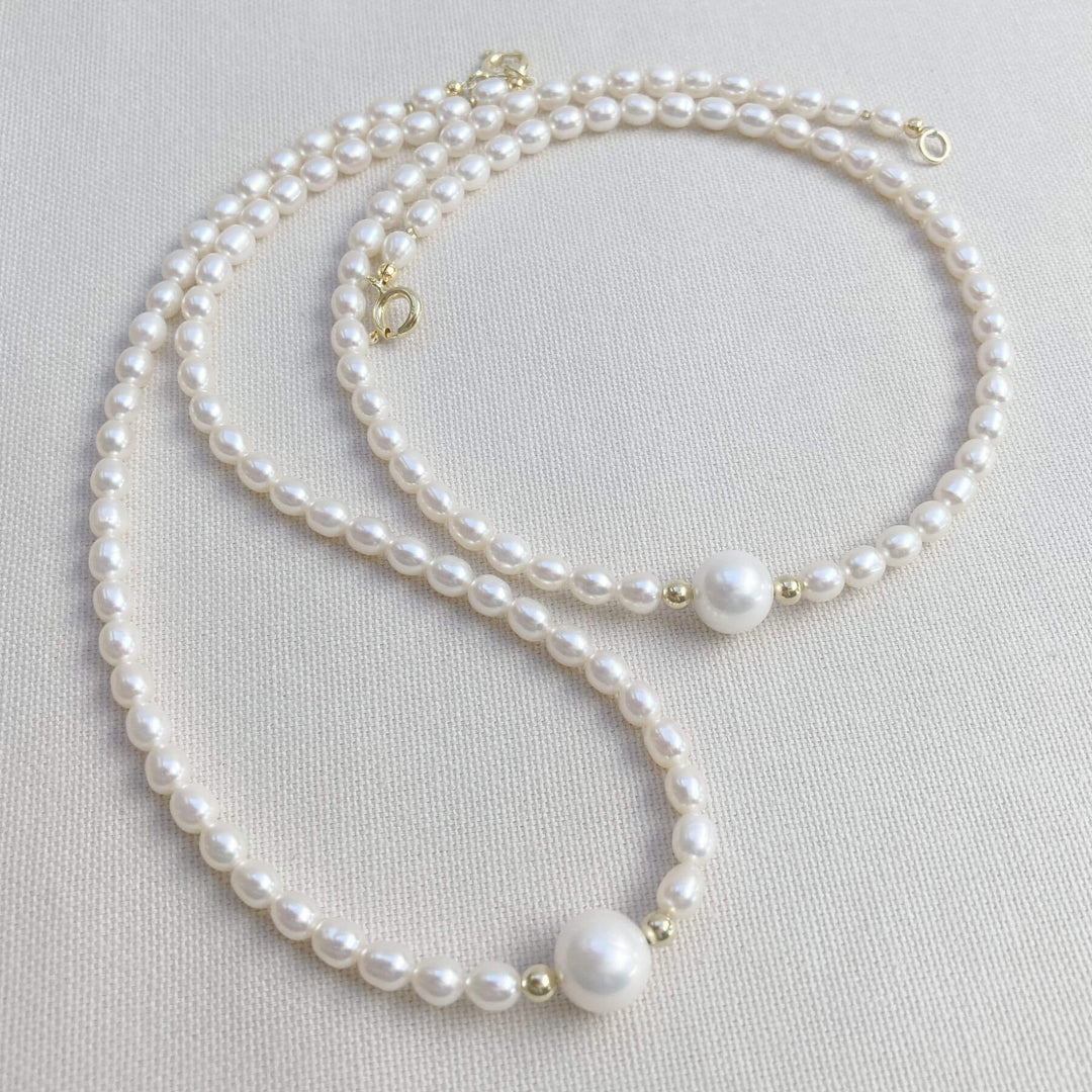 Weiße Perlenkette mit großer Mittelperle