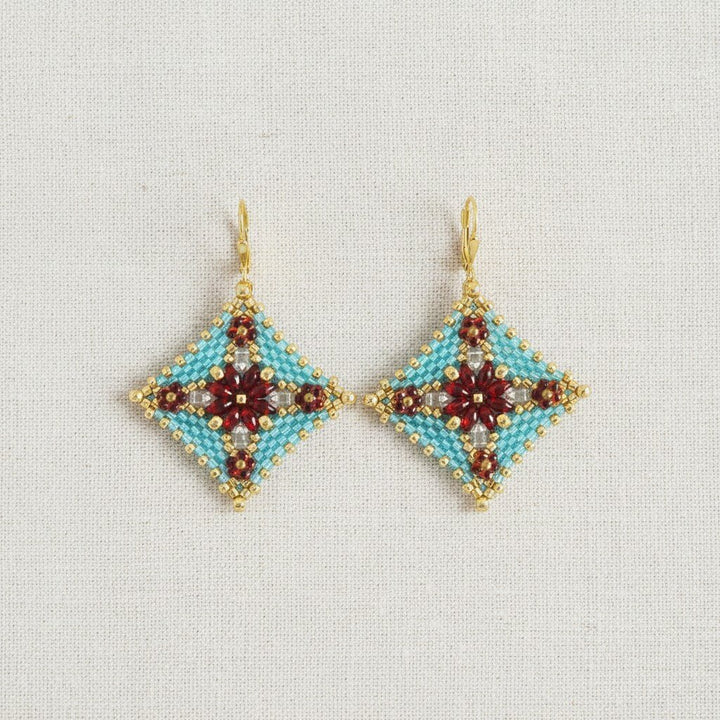 Peyote-Ohrringe in Türkis-Gold mit rotem Blumenmuster