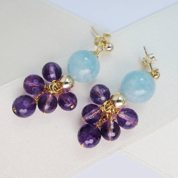 Vergoldete Edelstein-Ohrringe mit Aquamarin und Amethyst-Trauben